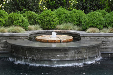 Pool fountain - small contemporary backyard rectangular natural pool fountain idea in Atlanta