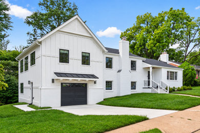 Large transitional white split-level mixed siding and board and batten house exterior idea in DC Metro with a shingle roof and a black roof