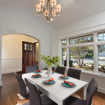 Dining room with vaulted ceiling and dormer window
