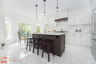 Example of a transitional kitchen design in Toronto