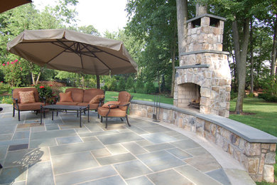 This is an example of a transitional patio in New York.