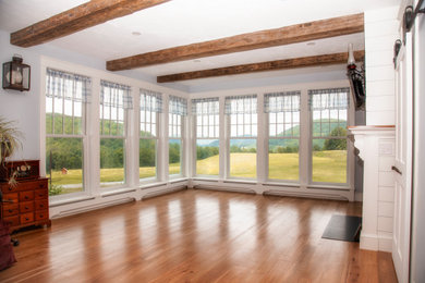 Example of a country living room design in Burlington
