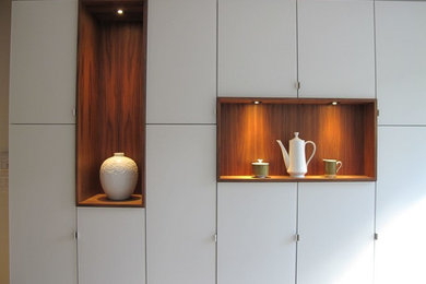 Inspiration for a mid-sized contemporary hallway remodel in Toronto with gray walls