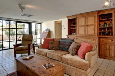Family room - country family room idea in Los Angeles