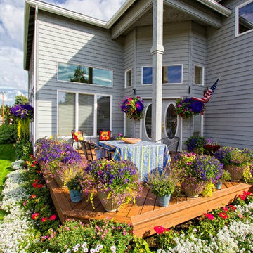Outdoor Living Spaces Created from Angled Front Deck and Back Decks
