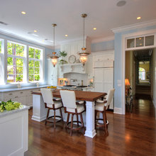 Ventahood cabinet built in; light blue walls in kitchen