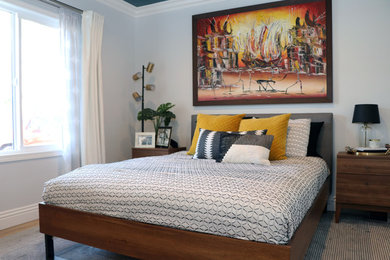 Trendy bedroom photo in Los Angeles with gray walls