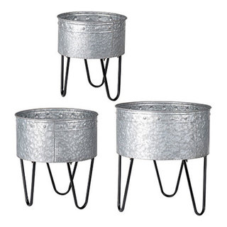 https://st.hzcdn.com/fimgs/9e11445e0aecb684_2660-w320-h320-b1-p10--industrial-outdoor-pots-and-planters.jpg