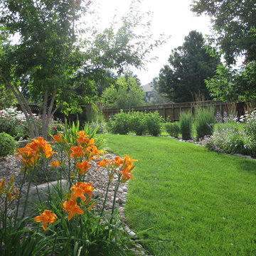 Seasonal Flowers in Boulder Bed