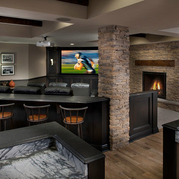 Basement remodel features home theater in Cranberry