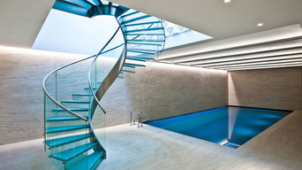 Luxury pool with spiral glass staircase