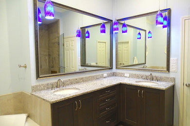 Bathroom - large transitional master beige tile and ceramic tile ceramic tile bathroom idea in Austin with shaker cabinets, dark wood cabinets, blue walls, a drop-in sink and quartz countertops