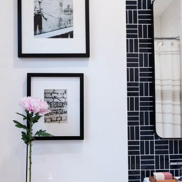 Classic and Fresh Bathroom with an exciting Navy Tile Wall