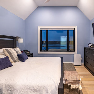 Vaulted Bedroom with Waterfront Views and Modern Coastal Design – Cape Ann MA