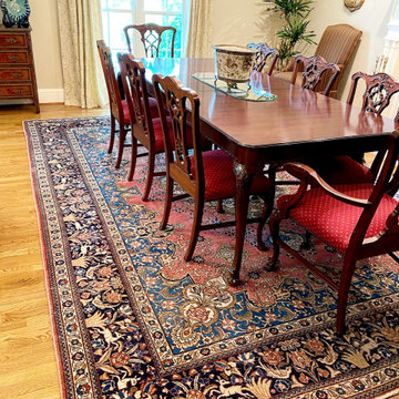 Vintage Persian Tabriz Rug charms dining room design!