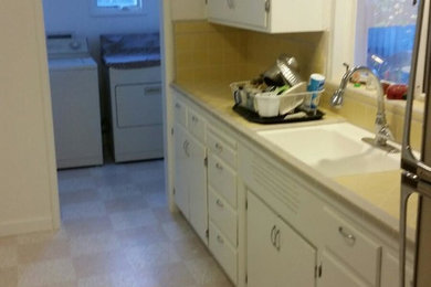 Kitchen - transitional kitchen idea in Other