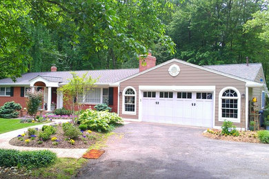 Inspiration for a mid-sized timeless beige one-story mixed siding exterior home remodel in DC Metro