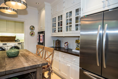 Example of a classic kitchen design in Other