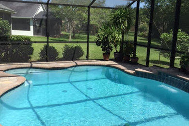 Inspiration for a contemporary pool remodel in Jacksonville