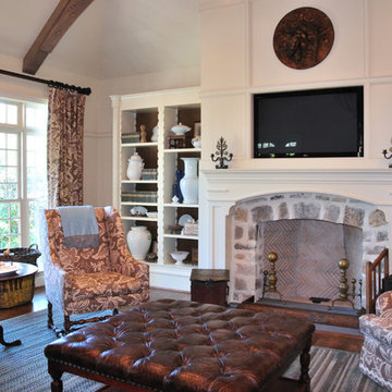Great Room fireplace flanked by bookcases
