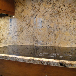 Flush-Mounted Induction Cooktop- yes, it's recessed into the granite! - Cooktops