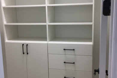 Example of a transitional closet design in Raleigh