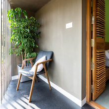Thrissur Houzz: A Union of Brick Walls, Metal Screens & Mangalore Tiles