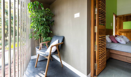Thrissur Houzz: A Union of Brick Walls, Metal Screens & Mangalore Tiles