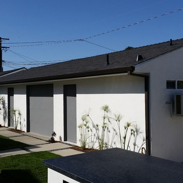 Costa Mesa, New Modern Home. Angle Face 5 inch Gutters, Smooth Downspouts.