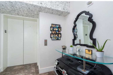 Example of an eclectic home design design in Miami