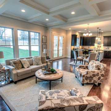 Open Floorplan Living Room w/Coffered Ceiling and Abundant Natural Lighting