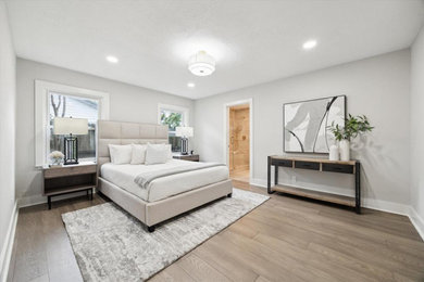 Example of a transitional bedroom design in Houston