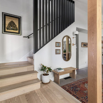Entry foyer with black railing — Nixon I, Reno interior design by Find Design