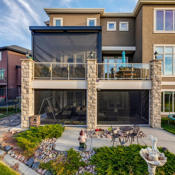 Adjustable StruXure Pergola & Lower Walkout Enclosed with Phantom Screens