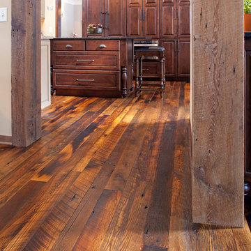 Antique Skip Oak Flooring Detail with Reclaimed Timber Post