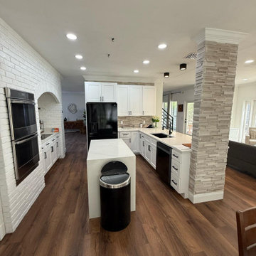 **Complete Kitchen, Flooring, Complete Stair Case and Trim