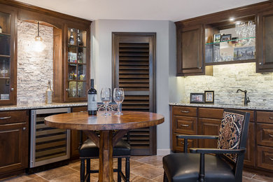 Inspiration for a mid-sized transitional carpeted and beige floor home bar remodel in Kansas City