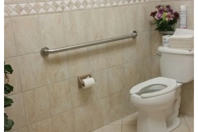 Bathroom - mid-sized traditional 3/4 beige tile and porcelain tile porcelain tile and beige floor bathroom idea in Boston with a one-piece toilet and beige walls