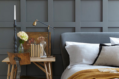 Inspiration for a transitional master white floor bedroom remodel in Belfast with black walls