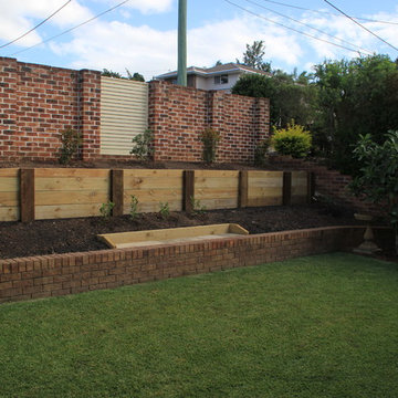 Retaining wall with garden beds
