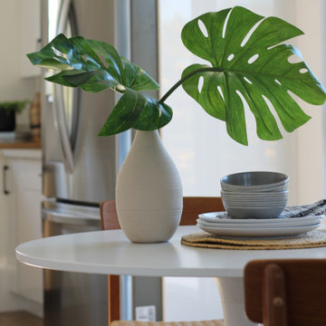 Monstera Leaves in Beige Bamboo Vase