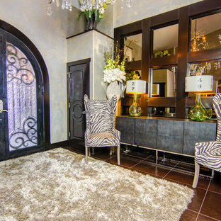 Design ideas for a large eclectic foyer in Cleveland with a double front door and a metal front door.