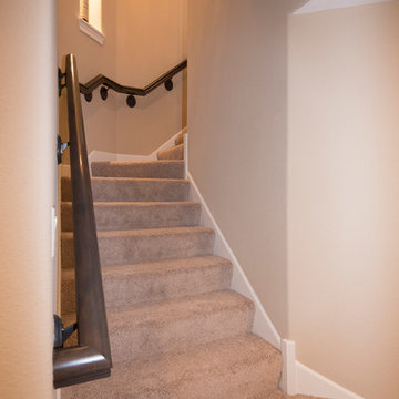 Stairs leading finished lower level