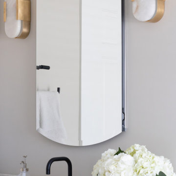 Wet Room Oasis versus Cigar Lounge Style in Dual Bath Remodel