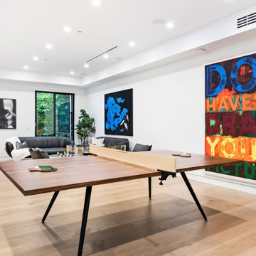 Beverly Hills Game Room with Ping Pong Table and Art Feature Wall