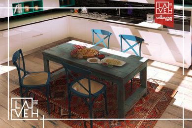 Example of a mid-sized minimalist laminate floor and brown floor eat-in kitchen design in Other with a double-bowl sink, open cabinets, white cabinets, quartzite countertops and brick backsplash