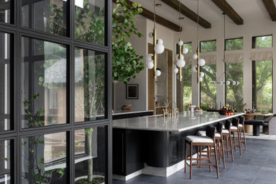 Mid-sized trendy galley kitchen photo in Dallas with an undermount sink, shaker cabinets, black cabinets, marble countertops, white backsplash, stainless steel appliances, two islands and white countertops