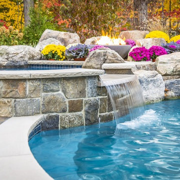 Freeform swimming pool with a raised spa and grotto, Mahwah, NJ