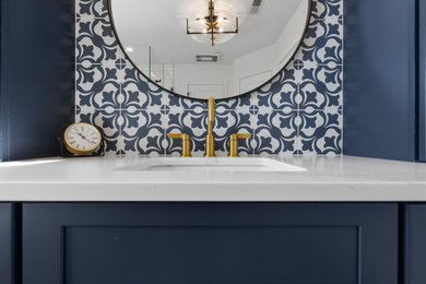 Powder room - transitional powder room idea in Milwaukee