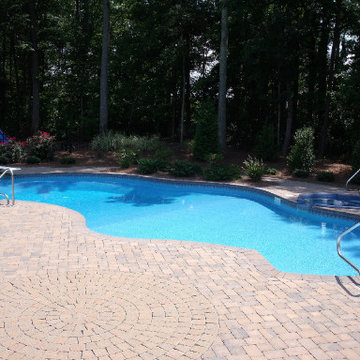 Pools- Custom pool with paver deck.